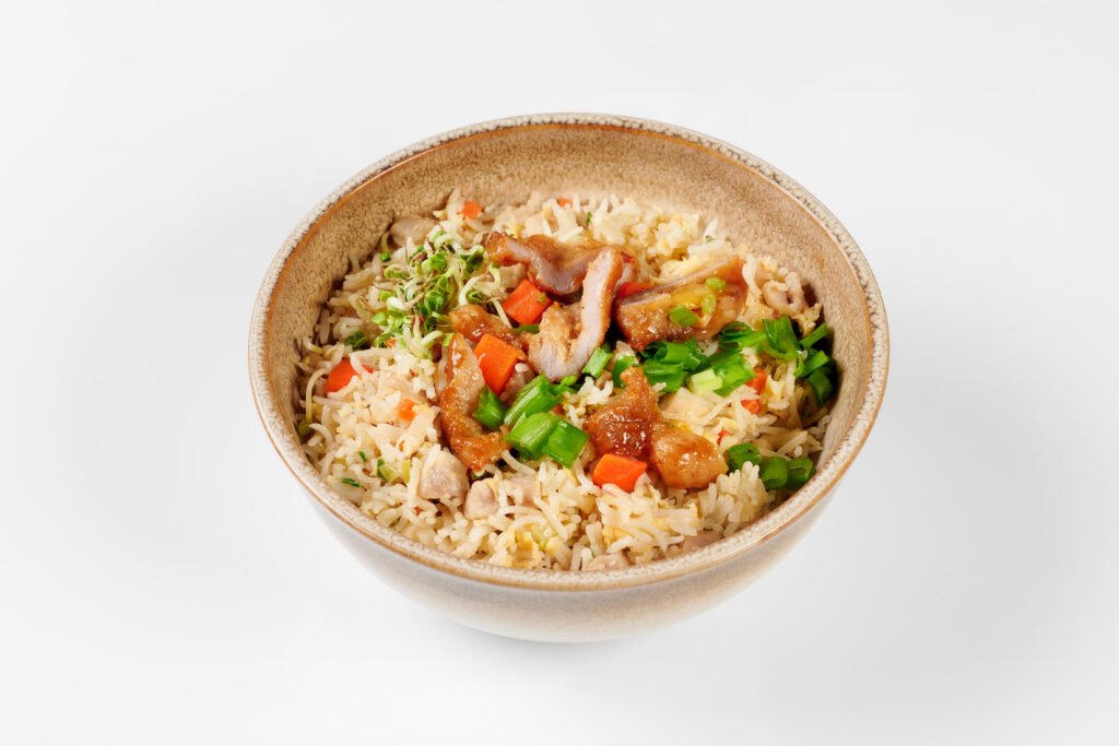 KEPTI RYŽIAI SU KIAULIENA IR DARŽOVĖMIS